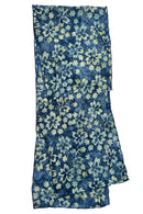 A lightweight blue scarf with a watercolor-style floral print in light blue, green, and yellow, shown flat.