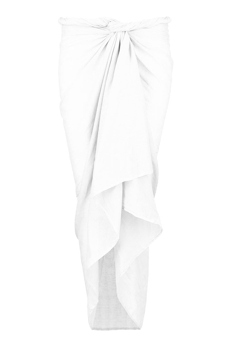 A white wrap sarong folded as a skirt with a knotted waist and layered, asymmetrical ruffle hem.