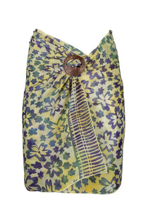 Batik printed mini sarong wrapped as a skirt with a coconut buckle to tye it