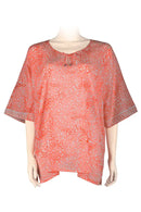 crocodots patterned blouse printed batik in orange and white colors