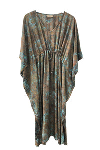 Long kaftan hundred percent silk printed batik by hand - big flower pattern - brown and turquoise tones - with self fabric inner belt pulled to show the folds