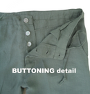 Green shirt with button details on a white background