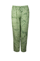 Green patterned pants batik on a white background