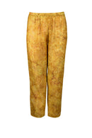 Gold pants seaweed motif batik on a white background